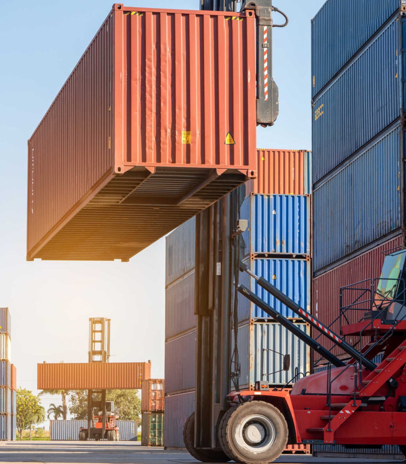 forklift-working-in-the-container-cargo-yard-port-2022-09-21-22-02-19-utc forklift-working-in-the-container-cargo-yard-port-2022-09-21-22-02-19-utc